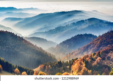 Scenic mountain landscape. View on the Black Forest, Germany, covered in fog. Colorful travel background. - Powered by Shutterstock