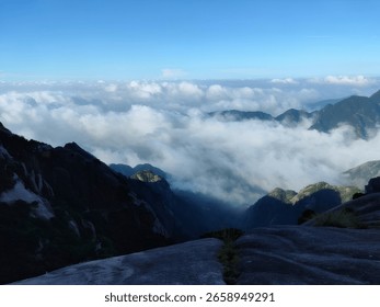 Scenic Mountain Range View with Clouds and Sky on a Bright Day in Nature