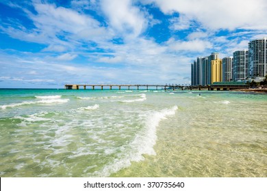 Scenic North Miami Beach Skyline With Condos, Resort Hotels, And Fishing Pier.