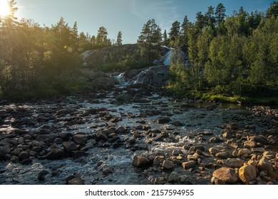 Scenic Norwegian Wilderness River with Rocky Bed. Scandinavian Summer Sunset Scenery. Norway, Europe. - Shutterstock ID 2157594955