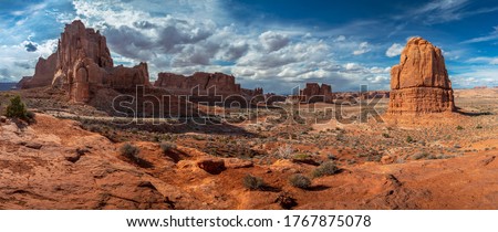 Scenic overlook of towering sandstone giants seen along Arches Scenic Drive near the Park Avenue section of Arches National Park, Moab, Utah