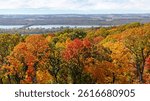 Scenic overlook view of colorful Autumn foliage and the Mississippi River from Pere Marquette State Park in Grafton, Illinois 