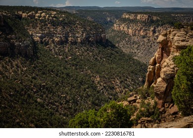 Scenic Overview of dry Riverbed Valley with Mountains of the Mesa Verde National Park in Colorado, USA - Shutterstock ID 2230816781