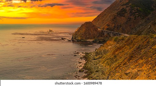 Scenic Panoramic View Of The California Coastline With Ocean Waves And Rocks On Pacific Coast Along Highway State Road 1.