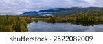 Scenic panoramic view of Reflection lake in Alaska during autumn time.