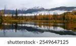 Scenic panoramic view of Reflection lake in Alaska during autumn time.