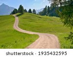 Scenic path in beautiful summer mountain pasture , Dolomites Italy, European Alps.