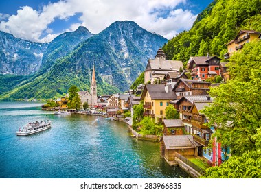 Scenic picture-postcard view of famous Hallstatt mountain village with Hallstaetter Lake in the Austrian Alps, region of Salzkammergut, Austria