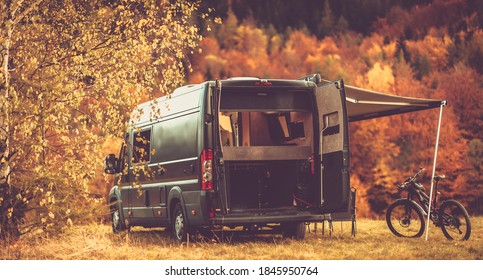 Scenic Recreational Vehicle RV Camping Spot with Fall Foliage Scenery. Class B Motorhome Boondocking in the Remote Place. Outdoor and Recreation Theme. - Shutterstock ID 1845950764
