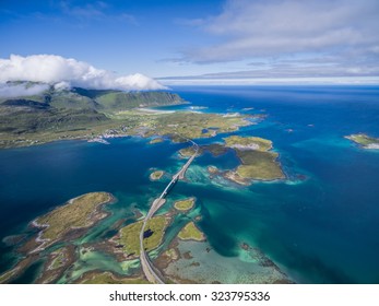 Scenic road bridges connecting islands on Lofoten in Norway, seen from air