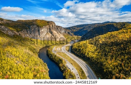 Scenic road in Canadian Mountain Landscape Valley with River. Fall Season. Corner Brook, Newfoundland, Canada.