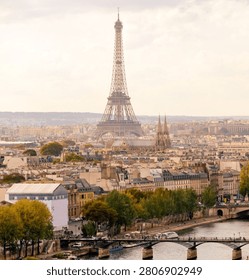 Scenic rooftop view over Paris, France, showcasing elegant historic architecture, classic Haussmann-style buildings, charming rooftops, and the timeless beauty of the French capital. Perfect for travel, tourism, architecture, European cityscapes, culture, and editorial or commercial projects.