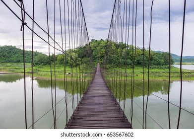 The scenic of rope bridge across the lagoon in Thailand