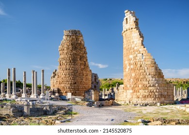 Scenic ruins of Hellenistic city gate in Perge (Perga) at Antalya Province, Turkey. Awesome view of the ancient Greek city. Perge is a popular tourist destination in Turkey.