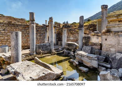 Scenic ruins of the latrines of Ephesus (Efes). Awesome view of public municipal toilets of the ancient Greek city at Izmir Province, Turkey. Ephesus is a popular tourist attraction in Turkey.