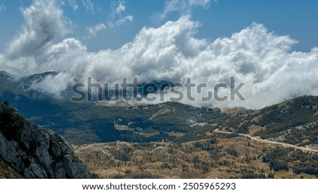 Similar – Image, Stock Photo Morning clouds rolling over the scenery and mountains over the Czech Republic creating different formations based on temperature, pressure and airflow. Meteorology