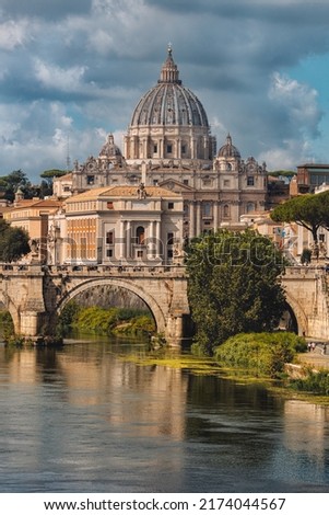 A scenic shot of the historically famous St  Peters Basilica in Vatican City during the cloudy day