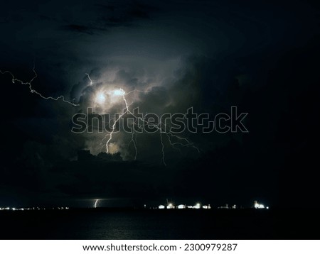 A scenic shot of a lighning strike at night