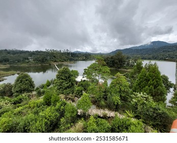 Scenic Situ Patenggang View from Pinisi Resto – Capturing Tranquil Lake, Lush Green Hills, and Unique Dining Experience in Bandung’s Natural Beauty - Powered by Shutterstock