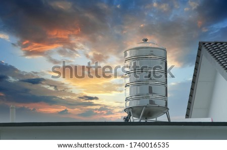 scenic sky on the roof of stainless steel storage water tank
