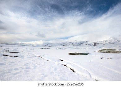 scenic snow covered mountains and glaciers of the Fjallsarlon Glacier in Iceland. 