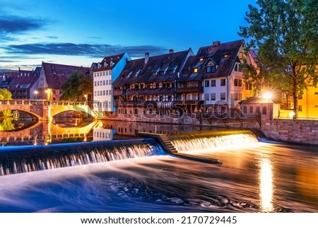 Scenic summer night view of the bridge over Pegnitz River in the Old Town of Nurnberg, Bavaria, Germany