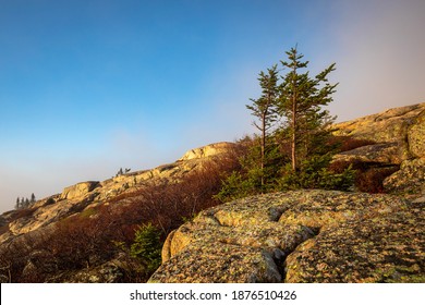 Scenic sunrise at the top of Cadillac mountain North Ridge trail Acadia National park