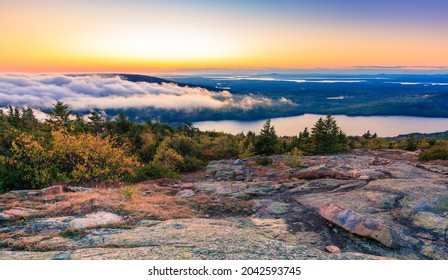 Scenic sunset in Acada National Park as seen from the top of Cadillac Mountain