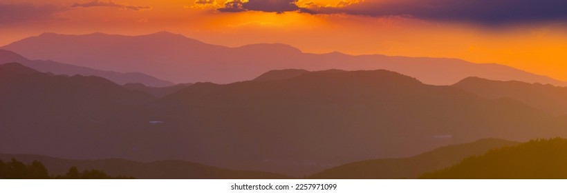 Scenic Sunset in the mountains. Beautiful natural background. Banner format. - Shutterstock ID 2257971099
