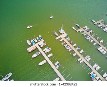 Scenic top down view of colorful boats near wooden berth in the countryside of Finland - Shutterstock ID 1742382422