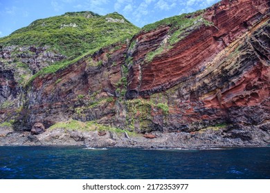 A Scenic, Unique Red Sea Cliff Formed By The Eroded Outer Rim Of An Ancient Super Volcano On A Famous Island In The Japan Sea.