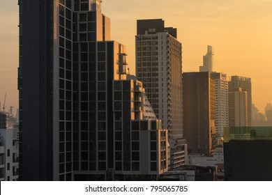 Scenic Of Urban Cityscape On Sunrise Light Pass Through The Building