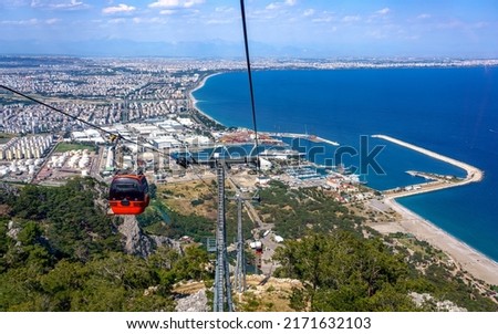 Scenic view to Antalya city, sea and cable road Tunektepe from the mountain, Turkey. BLURRED background. Stock photo © 