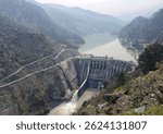 A scenic view of Baglihar Dam, also known as the Baglihar Hydroelectric Power Project, located on the Chenab River in Jammu and Kashmir, India.