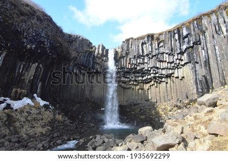 Similar – Waterfall in Iceland in cloudy weather