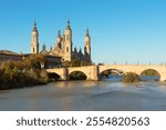 Scenic view of Basilica del Pilar and Puente de Piedra over the Ebro River in Zaragoza, Spain.