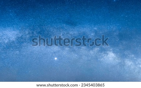 A scenic view of a breathtaking starry night sky