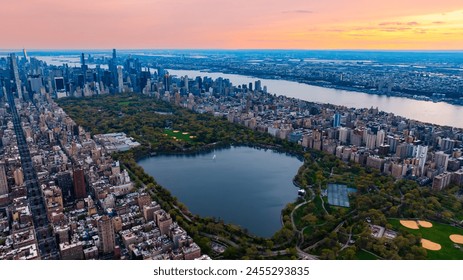 Scenic view of Central Park in the cityscape of New York, the USA. Aerial perspective. Enormous city panorama at sunset. - Powered by Shutterstock