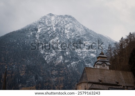 Similar – Foto Bild Kapelle auf schneebedecktem Berg zur goldenen Stunde bei Sonnenaufgang