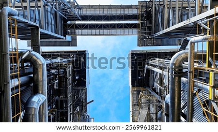 Scenic View of a Circulating Fluidized Bed Boiler from the Central Perspective Between Two Units. 