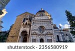 Scenic view of Colleoni Chapel (Cappella Colleoni) and Basilica of St. Mary Major (Santa Maria die Maggiore) at Piazza del Duomo in Bergamo, Lombardy, Italy. Landmark is located old town of the city