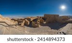 Scenic view of the Dead Sea and the ancient fortification Masada in the Southern District of Israel situated on top of an isolated rock plateau, eastern edge of the Judaean Desert, Israel