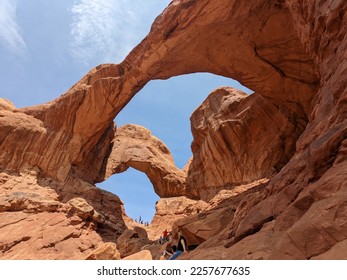 Scenic view of Double Arch red rock formation at Arches National Park in Moab, Utah. Tourist attraction. - Shutterstock ID 2257677635