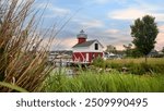 Scenic view of Douglas light house red painted wall in the Michigan state.