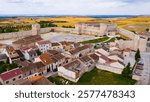 Scenic view from drone of Cuellar cityscape with medieval Castle of Dukes of Alburquerque, Spain