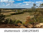 Scenic view of farm fields and a creek with a cloudy sky from Frenchman