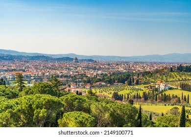 Scenic view of Florence from Settignano, with Brunelleschi's dome on the background and tuscan countryside around, on a bright day. Tuscany region, Italy.