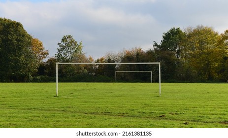 Scenic view of a football pitch with a goalpost in a public park