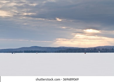 Scenic View Of A Frozen Long Pond In The Belgrade Lakes Region In Maine.  