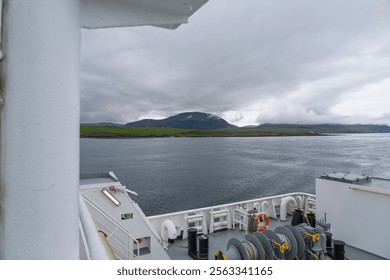 Scenic view of Graemsay Island with Low Lighthouse from a ferry - Powered by Shutterstock